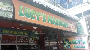 Lucy Massage: shopfront and sign